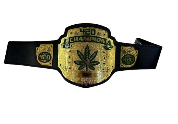 Side angle of 420 Weed World Wrestling Championship Belt showing leather strap and gold detailing of 420 championship belt