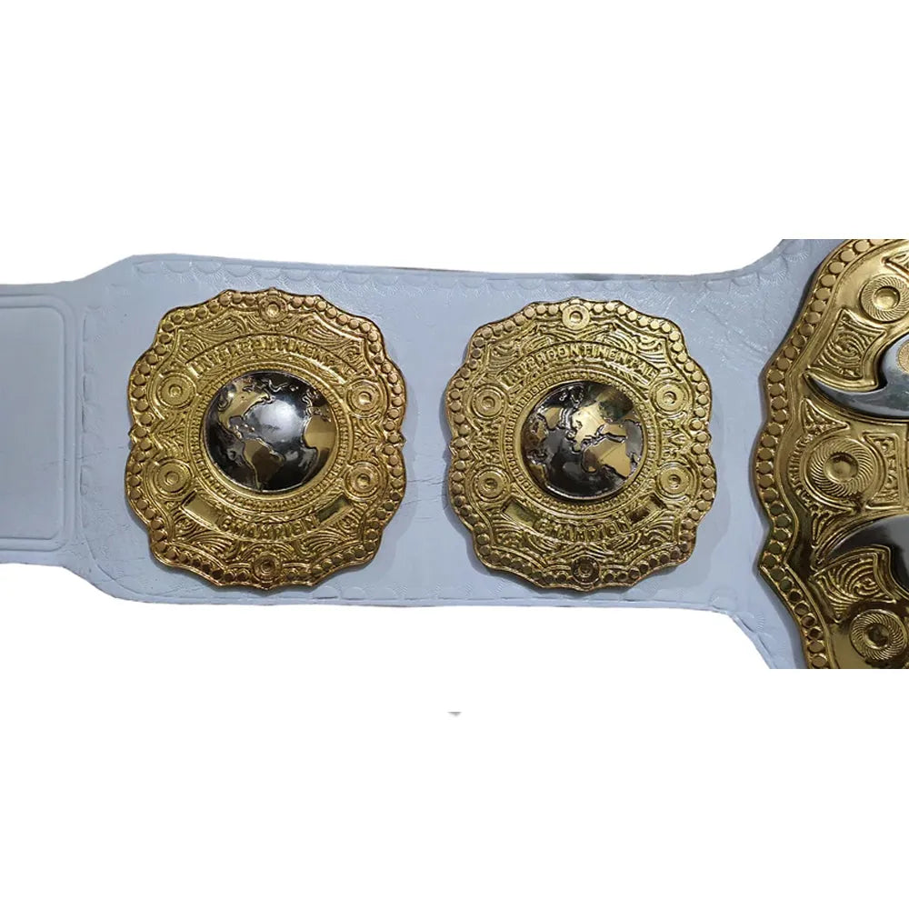 Close-up of a white IWGP championship belt for sale with detailed gold plates and globe design