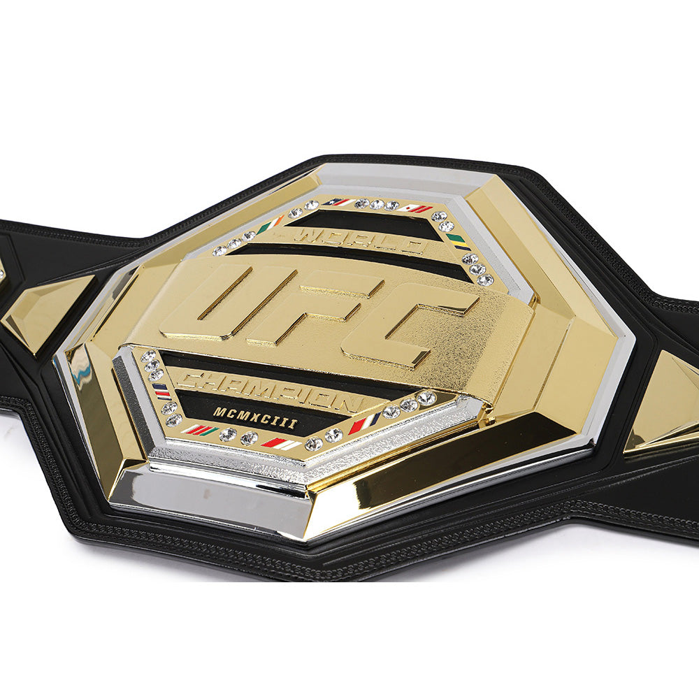 Close-up of UFC legacy replica belt with gold and black detailing from Wrestling Title Belts
