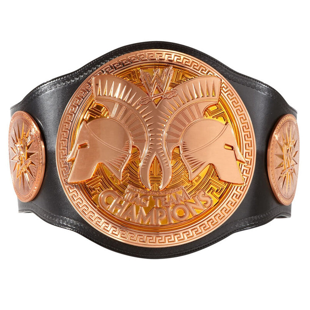 WWE tag team championship belt with gold Spartan helmet design on black leather strap